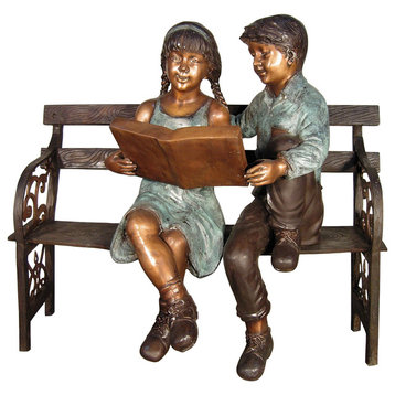 Boy and Girl Reading on a Bench Sculpture