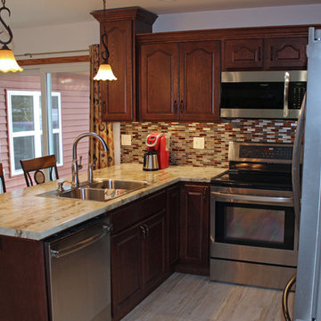 Kitchen Design: StarMark Cabinetry in Oak Royale, HD Formica Countertop