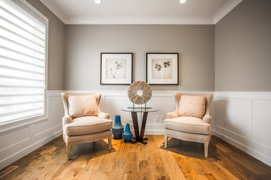 Inspiration for a mid-sized modern formal and enclosed light wood floor living room remodel in Other with brown walls, no fireplace and no tv