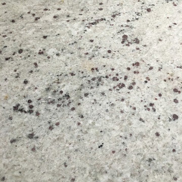 Honed Bianco Romano tops with 4" splash