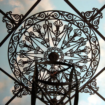 Hand Painted Wrought Iron Decorative Art in Ceiling and Wall Murals.