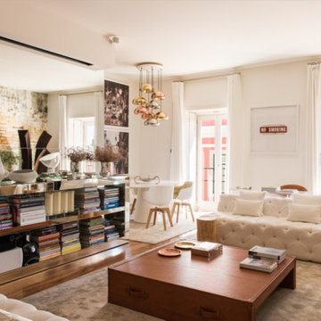 Chiado living room with brick wall, console and dining view