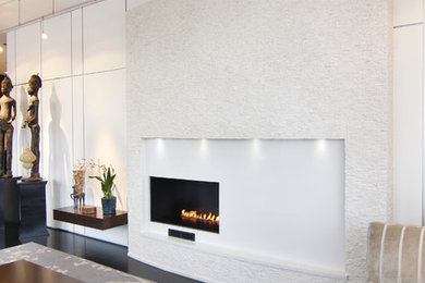 Trendy living room photo in Columbus with white walls and a ribbon fireplace