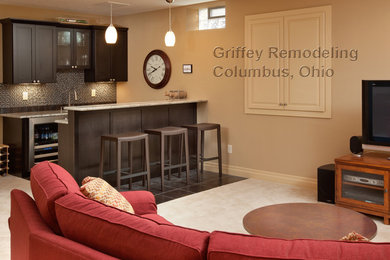 Example of a mid-sized trendy basement design in Columbus with beige walls
