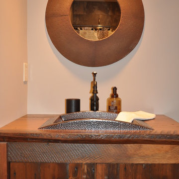 Artesa trough copper bath sink with recycled wood countertop
