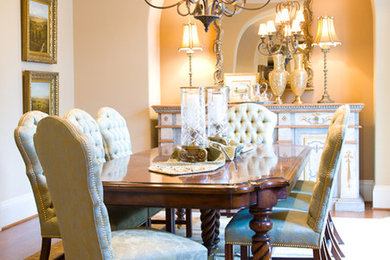 Mid-sized traditional separate dining room in Dallas with beige walls and medium hardwood floors.