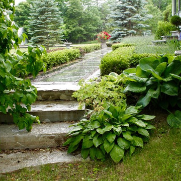 Peterborough, natural stone pathway and lush planting