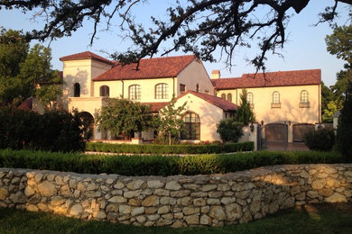 Inspiration for a mediterranean exterior home remodel in Dallas