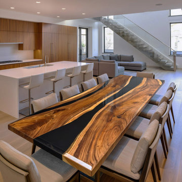 Integrating a Solid Walnut and Black Epoxy "River" Table into Contemporary Inter