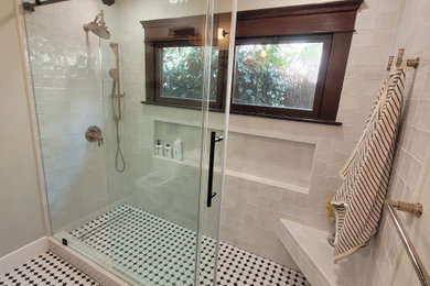 Inspiration for a mid-sized modern master white tile and ceramic tile ceramic tile, multicolored floor and single-sink bathroom remodel in Los Angeles with shaker cabinets, brown cabinets, a wall-mount toilet, green walls, a trough sink, quartz countertops, white countertops, a niche and a freestanding vanity