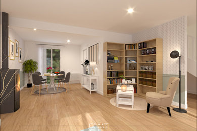 Cette photo montre un grand salon scandinave ouvert avec une bibliothèque ou un coin lecture, un mur vert, parquet clair, un poêle à bois, un téléviseur fixé au mur et du papier peint.