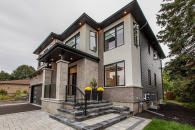 Example of a minimalist exterior home design in Ottawa