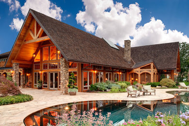 Example of a mountain style one-story wood gable roof design in Atlanta