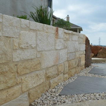 Multi-Level Patio with Hot Tub Water Feature and Boulder Staircase
