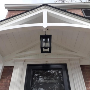 Front craftsman portico with arches