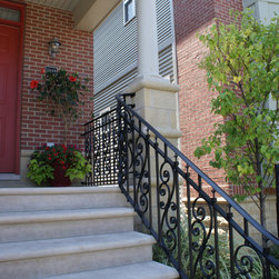 Solid stone stairs with ornamental iron railing - Products