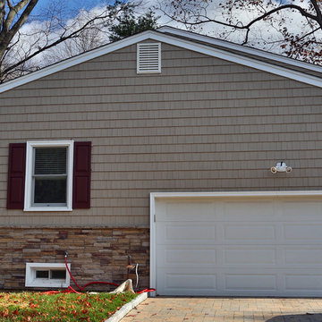 Siding and Versetta Stone.