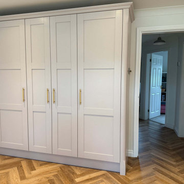 Green & Light Pink Shaker Kitchen in Thrapston