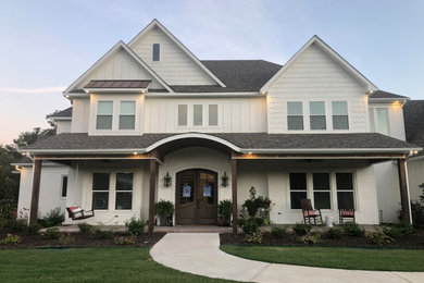 Inspiration for a large craftsman white two-story mixed siding house exterior remodel in Little Rock