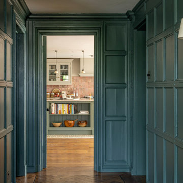 Hallway with painted panelled walls in a victorian villa renovation