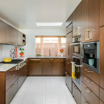 Mid-Century White Kitchen with Full Wall Storage