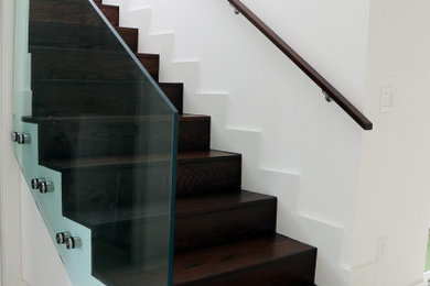 Example of a trendy staircase design in Detroit