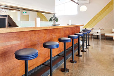This is an example of a contemporary home bar in Hobart.