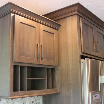 Bettendorf, IA- Gorgeous Galley Kitchen Remodel With Gray Stain and Quartz Tops