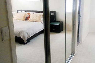 Photo of a modern bedroom in Brisbane.