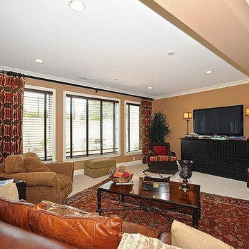 Basement Family Room of European Brick and Stone Home