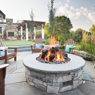 Design ideas for an expansive transitional patio in Minneapolis.