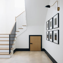 small storage door under stairs