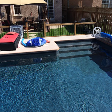 Contemporary C shaped Rectangle with Swim in stairs and swim in bench