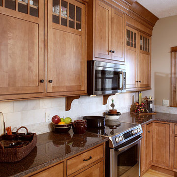Door style: Pendleton Inset  |  Species: Maple  |  Finish: Nutmeg with Walnut