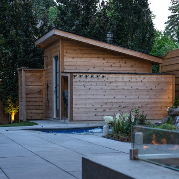 Pool with Rock Waterfall and Storage Shed