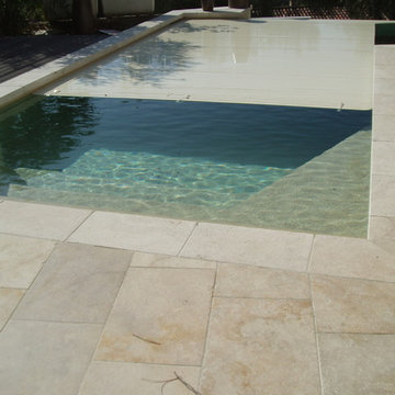 Couverture de piscine immergée sur débordement - Caisson fond de bassin