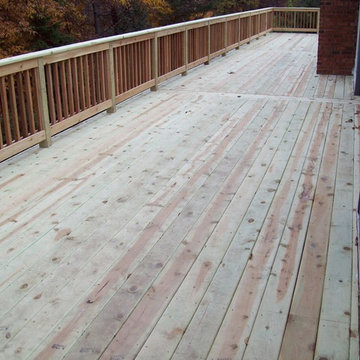 LARGE BASIC PRESSURE TREATED DECK WITH CEDAR INFILL AND BALUSTERS
