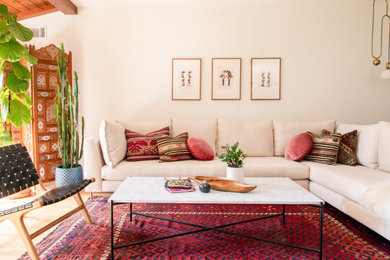 This is an example of a large midcentury open plan living room in Los Angeles.