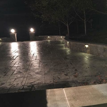 T-Stamped concrete patio, flagstone wall with columns