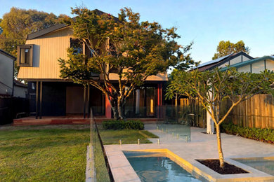 This is an example of a mid-sized contemporary exterior in Sydney.
