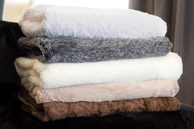 LUXE FAUX FUR THROWS
