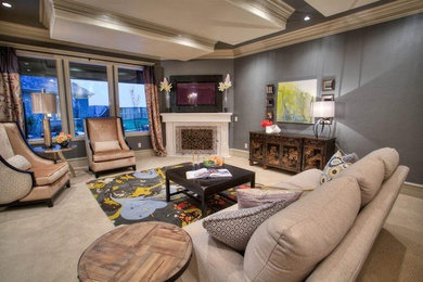 Living room - large eclectic open concept carpeted living room idea in Oklahoma City with gray walls, a standard fireplace and a wall-mounted tv