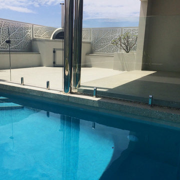 DS Grinding Services: Honed Concrete with infinity pool surround