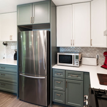 Cozy white and green kitchen