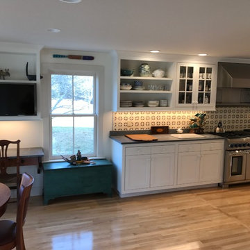 Kitchen with tiger maple and angled cabinets