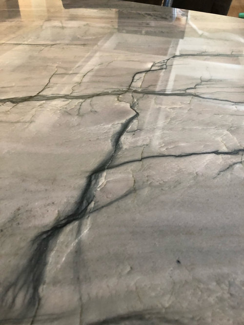 Newly installed granite crack vs fissure?