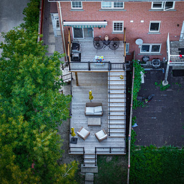 2024 Multi-Level Backyard Deck with Custom Railings and Seating Areas