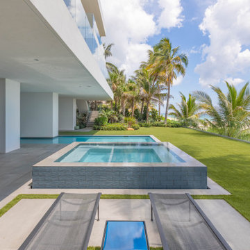 Custom Swimming Pool & Spa That Goes Underneath Part of the The House