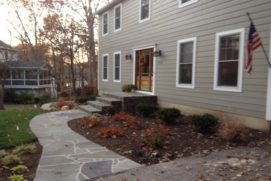 Mid-sized beige two-story wood exterior home photo in Baltimore