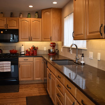 Eclectic kitchen preserving some of the cabinets